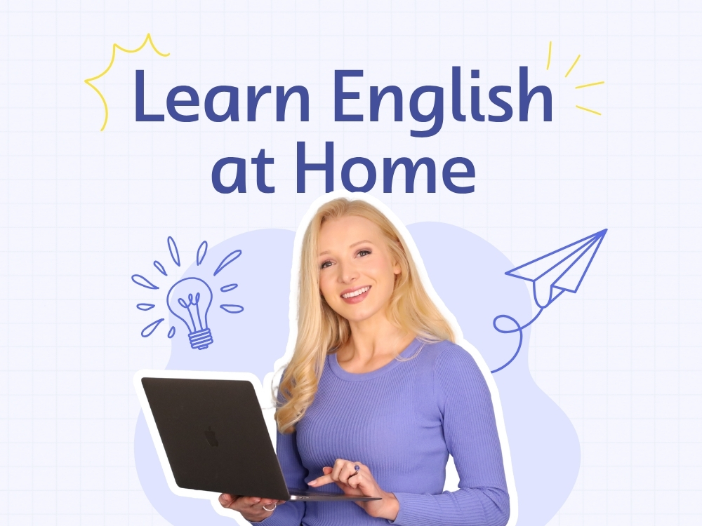Lucy teaching English online with a laptop for home learners